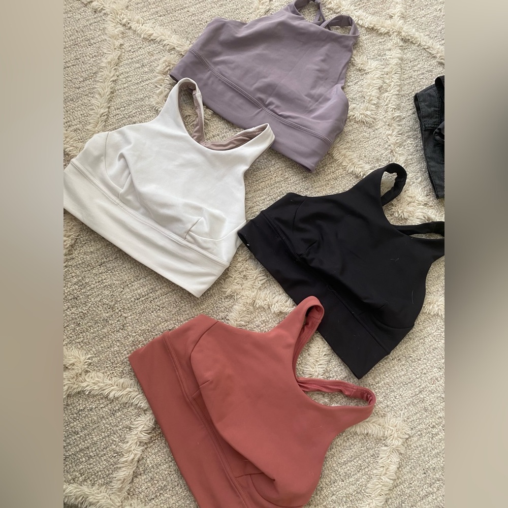 Set of 4 Lululemon high neck sports bras.